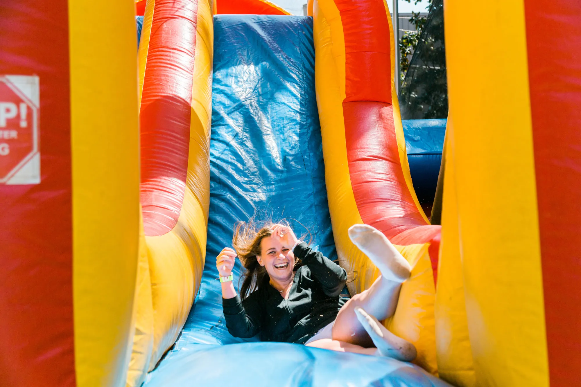 WPU Student on bouncy slide